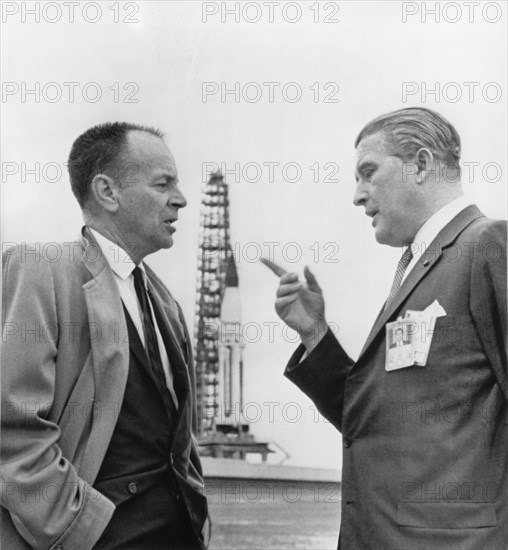 Dr. Wernher Von Braun and Harrison A. Storm Discussing SA-5 Saturn Launch Vehicle, Cape Kennedy, Florida, USA, 1964