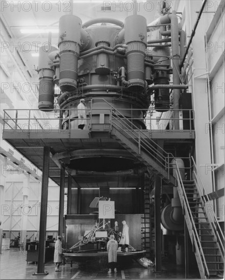 Engineers Surrounding Surveyor Spacecraft Before it's Lifted into Large Space Chamber for Testing, Hughes Aircraft Company, Los Angeles, California, USA, 1965