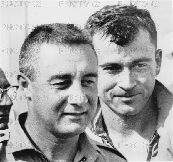 NASA Astronauts Virgil "Gus" Grissom and John Young, upon Completion of Gemini 3 Space Mission, Portrait, 1965