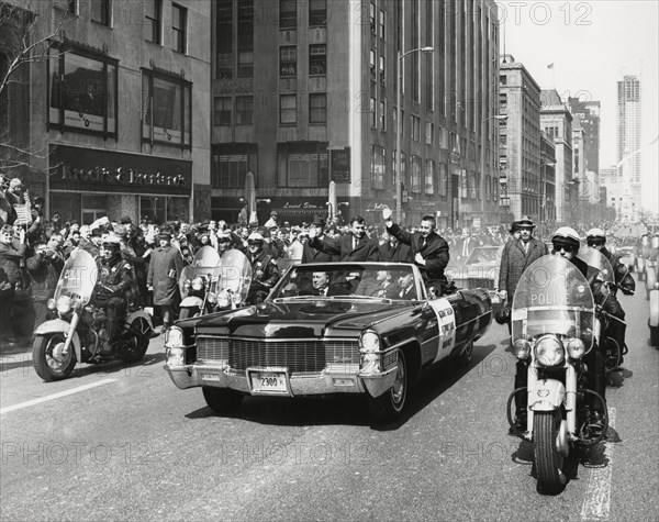Astronauts Virgil "Gus" Grissom and John Young Being Greeted by Crowd During Parade on Michigan Avenue after Completion of Gemini 3 Space Mission, Chicago, Illinois, USA, March 30, 1965