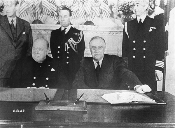 Prime Minister Winston Churchill (L) and President Franklin D. Roosevelt at Conference Table, White House, Washington, DC,  Dec. 22, 1941