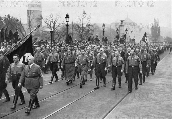Adolf Hitler, Julius Streicher (foreground, R), and Hermann Goering (L of Hitler) Retrace Steps of 1923 Beer Hall Putsch, Munich, Germany, November 9, 1934