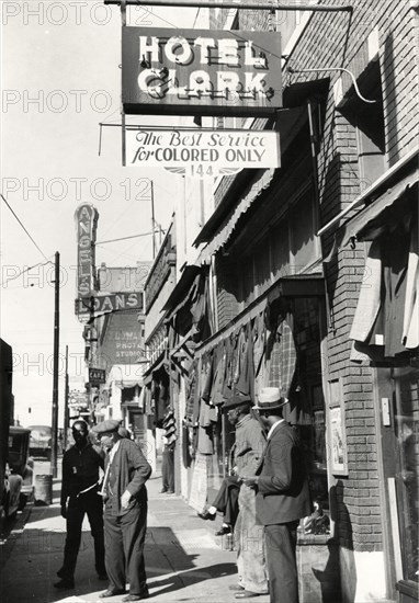Group of Men outside Secondhand Clothing Stores and Pawn Shop, Beale Street, Memphis, Tennessee, USA, 1939