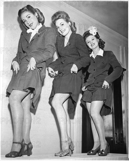 Three Models Showcasing Shoes made from Material that is not being Rationed during WWII, Chicago, Illinois, USA, 1944