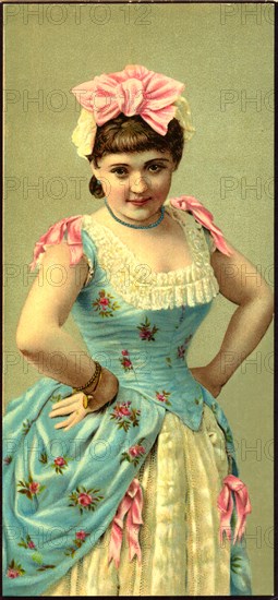 Young Woman in Blue Floral Dress with Pink Bow in Hair, Portrait, circa 1890