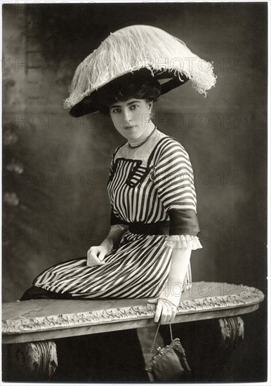 Fashionable Woman, Seated, in Striped Dress and Large Ostrich Hat, Chicago, Illinois, USA, circa 1915