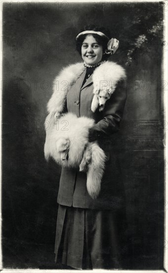 Smiling Woman Wearing Fox Fur Stole and Hand Muff, Portrait, circa 1918