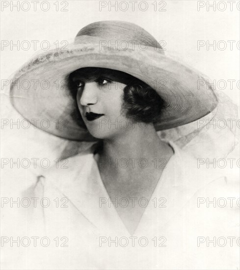 Woman in Large Hat of Soft Horsehair and Lace, Close-Up Portrait, circa 1922