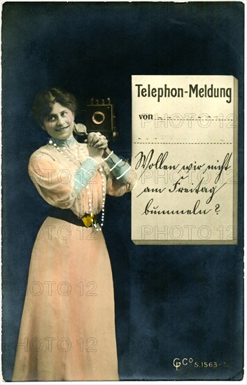 Woman in Long Dress Holding Telephone, circa 1907
