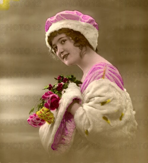 Woman in Pink Dress and Hat with Muff and Stole, Holding Roses, Portrait, French Postcard, circa 1910's