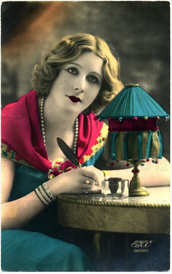 Woman in Blue Dress Seated at Desk Writing Letter with Quill Pen, Hand-Colored, French Postcard, circa 1910's