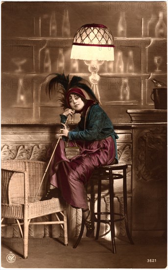 Smiling Woman Wearing Plume Hat Seated on Barstool and Holding a Walking Cane, Hand-Colored Postcard, circa 1910's