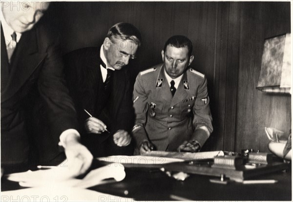 British Prime Minister Neville Chamberlain Signing Munich Agreement, Munich, Germany, September 30, 1938