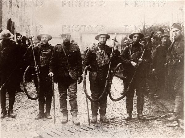 American Soldiers with Liquid Fire Machines (Flame Throwers)  Captured From German Troops, circa 1918