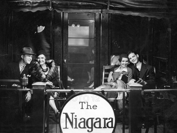 Robert Armstrong, Miriam Seegar, Eddie Quillan, on-set of the Film, "Big Money", 1930