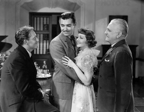 Spencer Tracy, Clark Gable, Claudette Colbert, Frank Morgan, on-set of the Film, "Boom Town", 1940