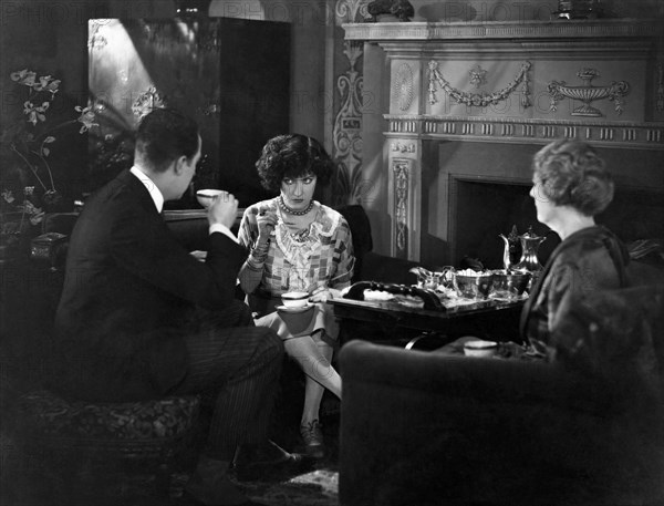 Eugene O'Brien, Gloria Swanson, Helen Dunbar, on-set of the Silent Film, "Fine Manners", 1926