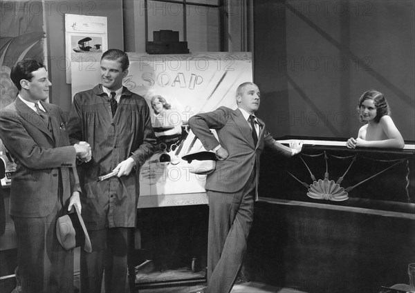 Norman Foster (left), Richard "Skeets" Gallagher (right), Marcia Manners, on-set of the Film, "It Pays to Advertise", 1931