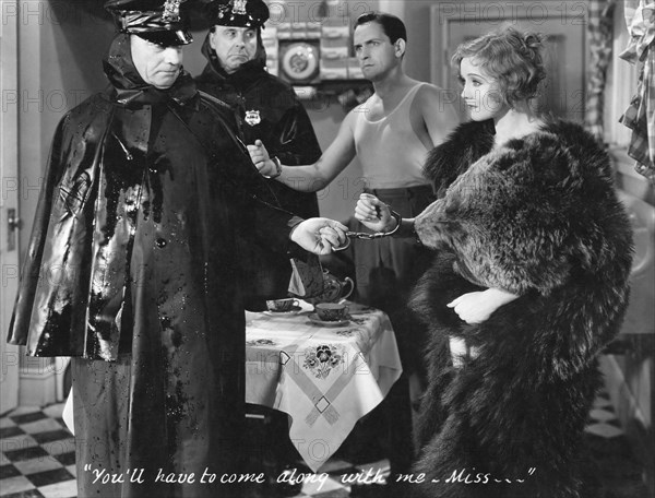 Fredric March and Nancy Carroll (right), on-set of the Film, "Laughter" , 1930