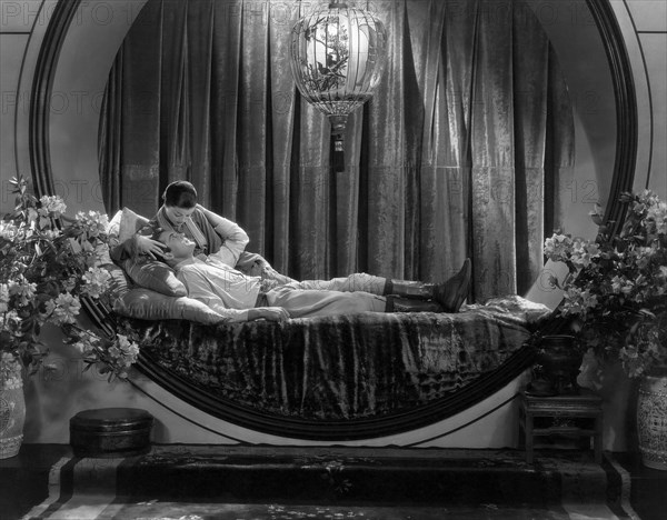 Myrna Loy, Charles Starrett, on-set of the Film, "The Mask of Fu Manchu", 1932