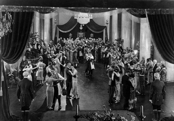 Mae Murray, John Gilbert, (center), Clark Gable, (as an extra, below right-hand canopy post), on-set of the silent film, "The Merry Widow", 1925