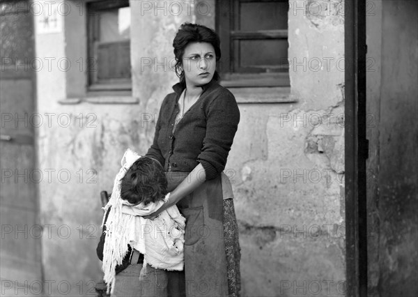 Anna Magnani, on-set of the film, "L'Onorevole Angelina", 1947