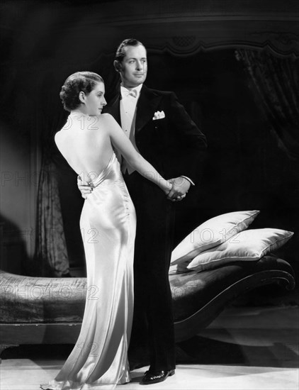 Norma Shearer, Robert Montgomery, on-set of the Film "Riptide", 1934