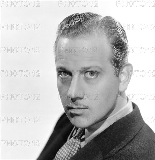 Melvyn Douglas, on-set of the Film "The Shining Hour", 1938