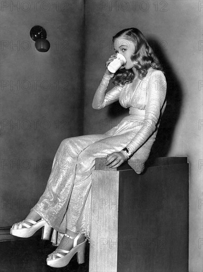 Veronica Lake, Drinking Cup of Water on-set of the Film "This Gun for Hire", 1942