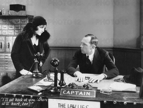 Evelyn Brent, Hal Skelly, on-set of the Film "Woman Trap", 1929
