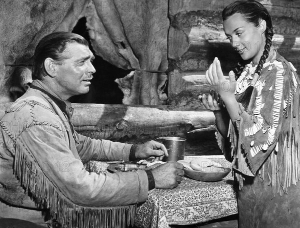 Clark Gable, Maria Elena Marques, on-set of the Film "Across the Wide Missouri", 1951
