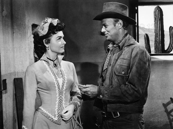 Donna Reed, Richard Widmark, on-set of the Film "Backlash", 1956