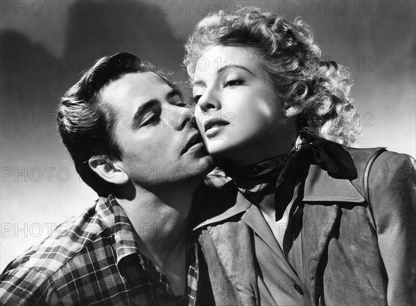 Glenn Ford, Evelyn Keyes, on-set of the Film "The Desperadoes", 1943