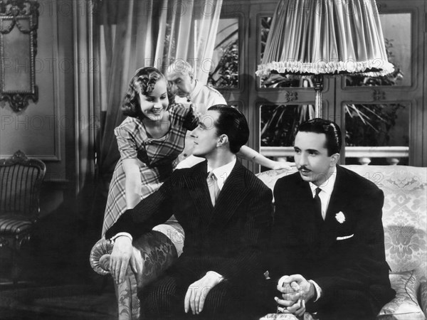 Vittorio De Sica, (center), on-set of the Film "Do You Like Women" (aka Teresa Venerdi), 1941