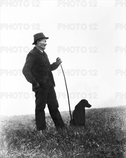 Man with Dog, on-set of the Documentary Film "Farrebique Ou Les Quatre Saison", Directed by Georges Rouquier, 1946
