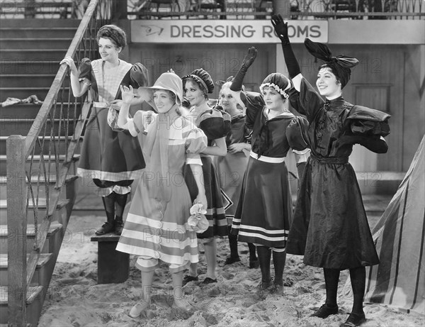 Marion Davies, (front), Ilka Chase, (right), on-set of the Film "The Floradora Girl", 1930