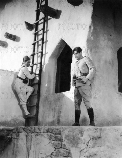 Richard Arlen, (right), on-set of the Silent Film "The Four Feathers", 1929