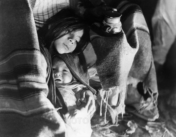 Young Girl Holding Baby, on-set of the American Documentary Film "The Forgotten Village", 1941