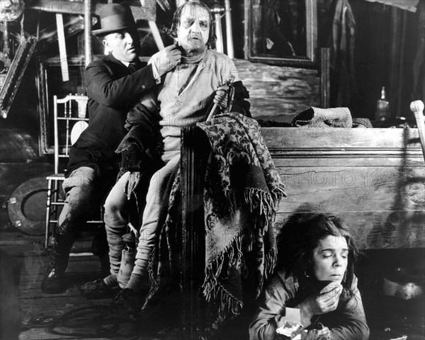 Makeup Artist, (left), attending to Cesare Gravina, Dale Fuller, on-set of the Silent Film "Greed", 1924
