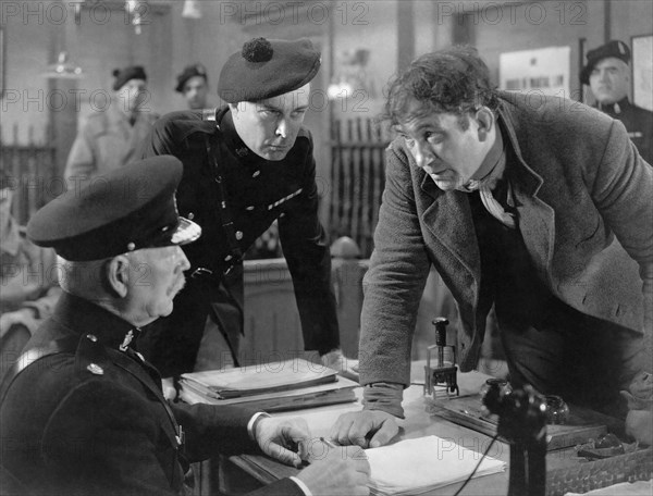 Victor McLaglen, (right), on-set of the Film "The Informer", 1935