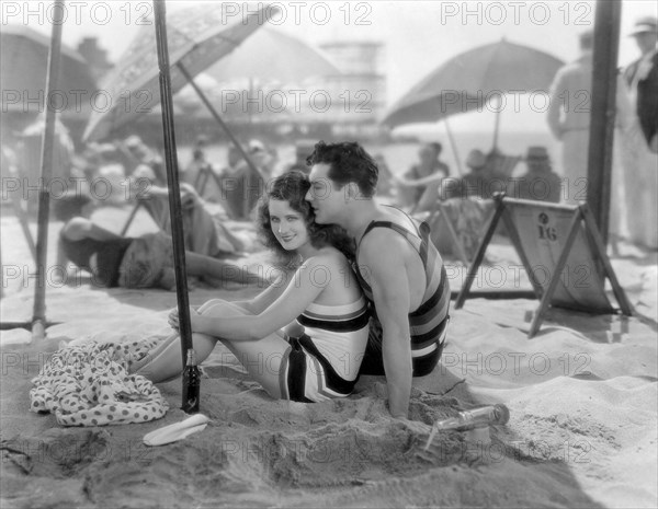 Norma Shearer, Johnny Mack Brown, on-set of the Silent Film "A Lady of Chance", 1928