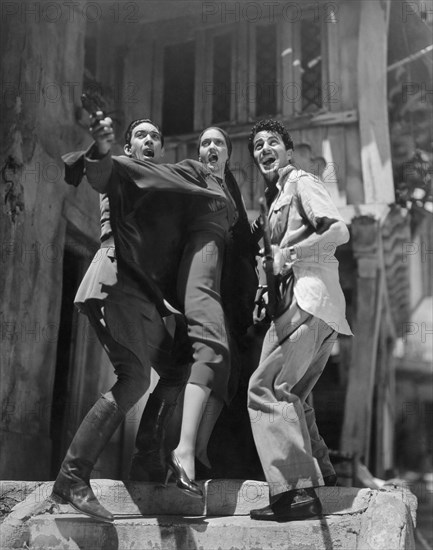 Anthony Quinn, Dorothy Lamour, Gilbert Roland, on-set of the Film "The Last Train from Madrid", 1937