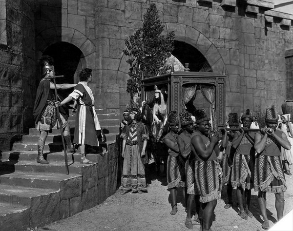 Albert Roscoe, (holding cross), Theda Bara, on-set of the Silent Film "Salome", 1918