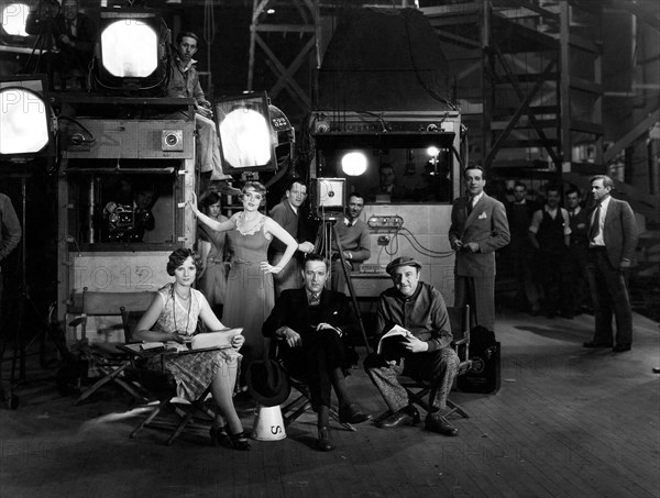 Blanche Sweet, (standing), Jack Mulhall, (second from right), on-set of the Film "Show Girl in Hollywood", 1930