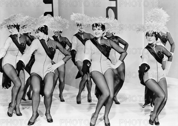 Judy Garland with Showgirls, on-set of the Film "A Star is Born", 1954