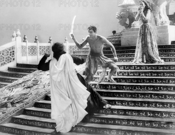 John Justin, (center), June Duprez, on-set of the Film "The Thief of Baghdad", 1940