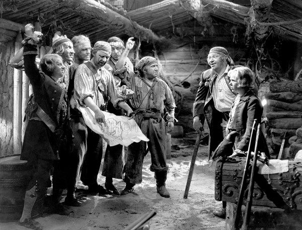 Wallace Beery, Jackie Cooper (right), on-set of the Film "Treasure Island", 1934