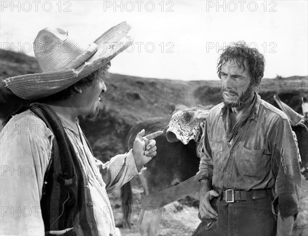 Humphrey Bogart, (right), on-set of the Film "The Treasure of the Sierra Madre", 1948