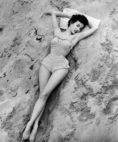 Actress Rita Moreno, Portrait in Bathing Suit on Beach, circa mid-1950's