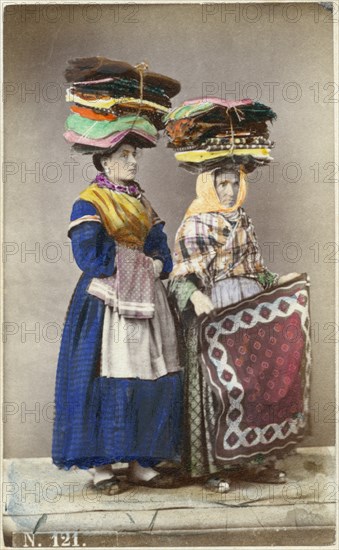 Two Women with Bundles of Fabric on Their Heads, Italy, circa 1880's